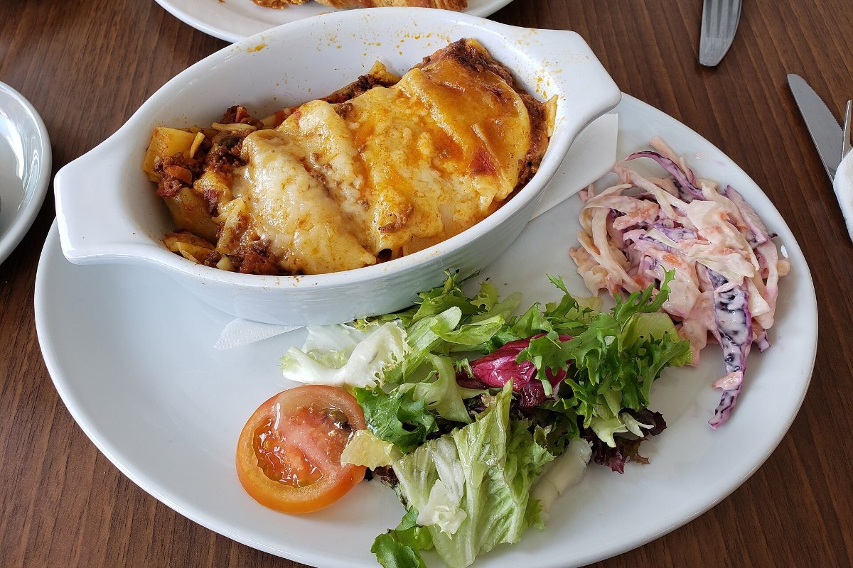 A portion of beef lasagna.